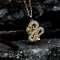 Elegant gold zircon dragon pendant by MANDOTOS featuring detailed dragon design and sparkling zircon accents.