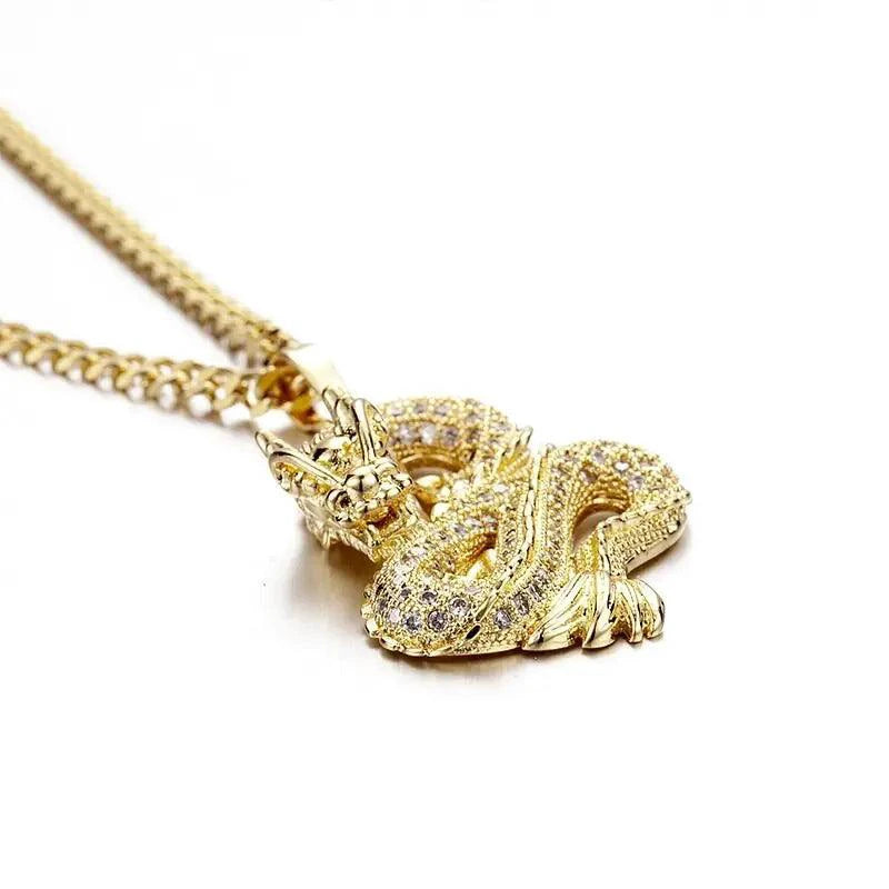 Elegant gold zircon dragon pendant by MANDOTOS featuring intricate design and sparkling gemstone accents.