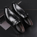 Elegant leather Oxfords by MANDOTOS featuring classic design and polished finish, perfect for formal and stylish occasions.