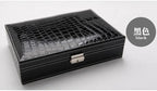 Elegant leather vanity case by MANDOTOS with a sleek design and multiple compartments for cosmetics and personal items.