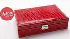 Elegant leather vanity case by MANDOTOS with a sleek design, featuring a secure clasp and spacious interior for beauty essentials.