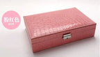 Elegant leather vanity case by MANDOTOS with a sleek design, featuring a compact shape and quality leather finish.