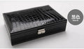 Elegant leather vanity case by MANDOTOS with a sleek design, featuring a secure clasp and spacious interior for cosmetics and accessories.