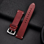 Mandotos elegant leather watch band in brown with stitched detailing, designed for a classic and stylish look.