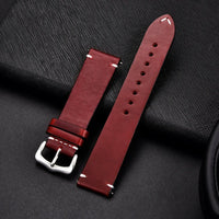 Mandotos elegant leather watch band, brown strap with stitching, designed for stylish wristwear and comfortable fit.