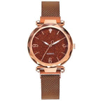 Elegant rose gold MANDOTOS timepiece with a sleek design and a round watch face, showcasing a luxurious wristwatch.