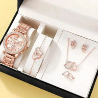 Elegant rose gold watch ensemble by MANDOTOS featuring a stylish watch, bracelet, and accessories on a neutral background.