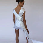 Elegant sleeveless dress by MANDOTOS featuring a stylish design, perfect for formal or casual occasions.