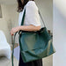 Elegant women's tote bag by MANDOTOS featuring a stylish design and spacious interior, perfect for everyday use.