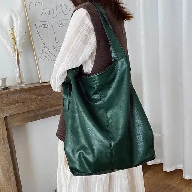 Elegant women's tote bag by MANDOTOS featuring a sleek design and spacious interior for versatile everyday use.