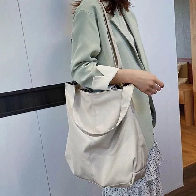 Elegant women's tote bag by MANDOTOS featuring a stylish design and spacious interior for everyday use.