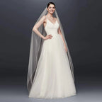 Long flowing veil from ElegantBride V14 collection by MANDOTOS, made of sheer tulle with delicate lace edge for bridal elegance.