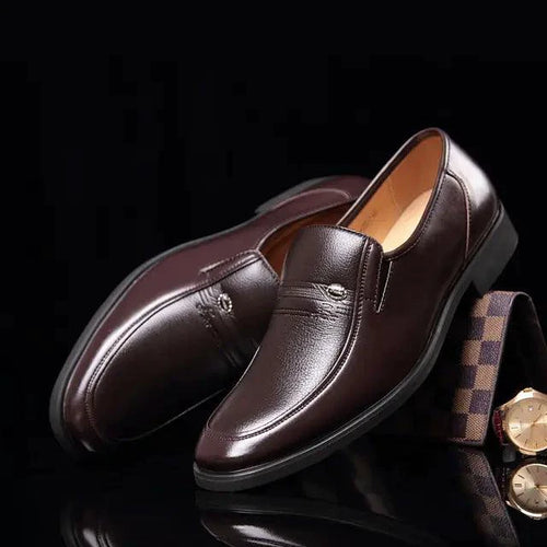 Mandotos Elite leather dress shoes featuring sleek black design and polished finish, perfect for formal occasions.