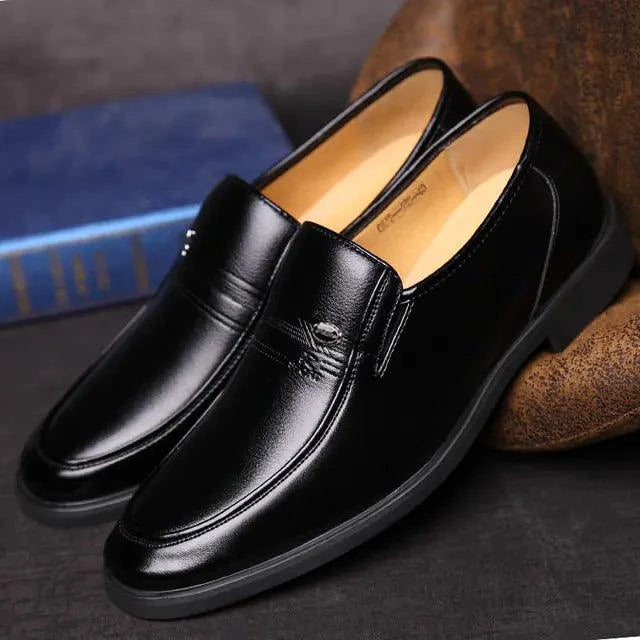 Mandotos Elite Leather Dress Shoes featuring polished black leather uppers and sleek design for formal occasions.