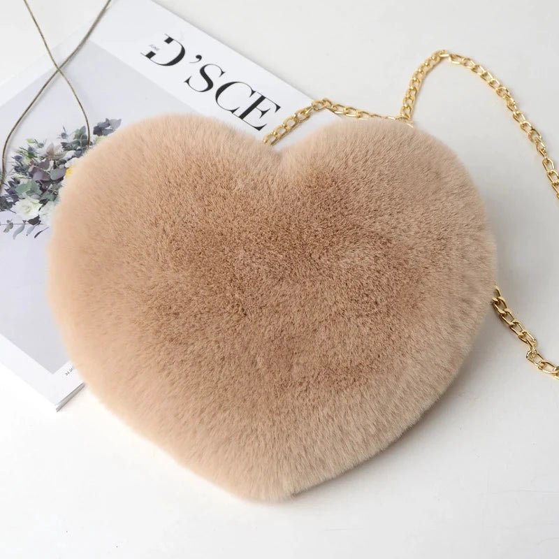 Mandotos women's heart-shaped faux fur crossbody bag with plush texture and chain shoulder strap, ideal for stylish shopper totes.
