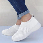 Mandotos flat knitted shoes with a soft, stretchy fabric upper and comfortable slip-on design for casual wear.