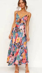 Mandotos floral boho chic midi dress with a flowy silhouette, featuring vibrant floral patterns and a relaxed fit.