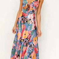 Mandotos floral boho chic midi dress with a flowy silhouette and vibrant floral pattern, perfect for casual or bohemian style.