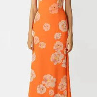 Mandotos floral elegance puff sleeve dress with a fitted bodice, vibrant floral pattern, and airy fabric for a stylish, feminine look.