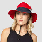 Girls' Ponytail UV Shield Sun Hat by MANDOTOS with wide brim and adjustable strap, providing sun protection for outdoor play.