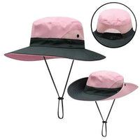 Girls' Ponytail UV Shield Sun Hat by MANDOTOS showing a pink sun hat with a wide brim and adjustable strap for sun protection.