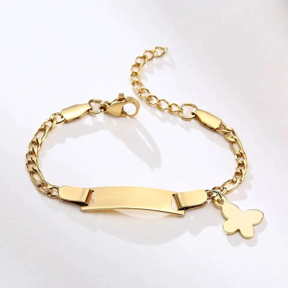 Gold butterfly charm bracelet for kids by MANDOTOS, featuring a delicate butterfly pendant and adjustable chain.