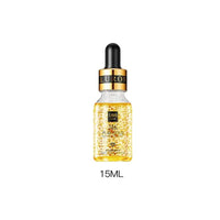 Mandotos Gold Essence Hyaluronic Serum in a clear glass bottle with gold accents, showcasing its luxurious packaging.