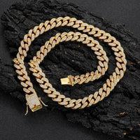 Gold Shine Iced Cuban Chain by MANDOTOS featuring a luxurious iced design and chunky Cuban link style for a bold jewelry look.