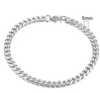 Gold-tone stainless steel Cuban bracelet by MANDOTOS, featuring 3-11mm wide links, displayed on a neutral background.