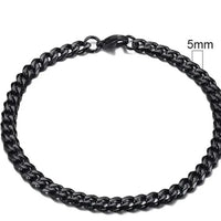 Gold-tone stainless steel Cuban bracelet by MANDOTOS, 3-11mm wide, showcasing a sleek, polished chain design.