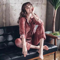 Gold velvet pajamas from MANDOTOS featuring a soft, luxurious fabric and relaxed fit, perfect for cozy loungewear.