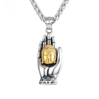 Golden Buddha pendant by MANDOTOS featuring intricate design and polished gold finish, hanging on a delicate chain.