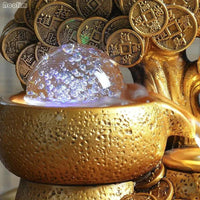 Mandotos Golden Prosperity Tree Fountain featuring a lush golden tree and flowing water display.