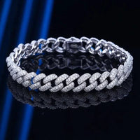 GoldFlex 18k Cuban link bracelet by MANDOTOS, showcasing a luxurious gold chain with a polished finish.