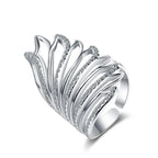 Mandotos Heavenly Diamond Wing Ring featuring a delicate wing design with sparkling diamonds on a silver band.