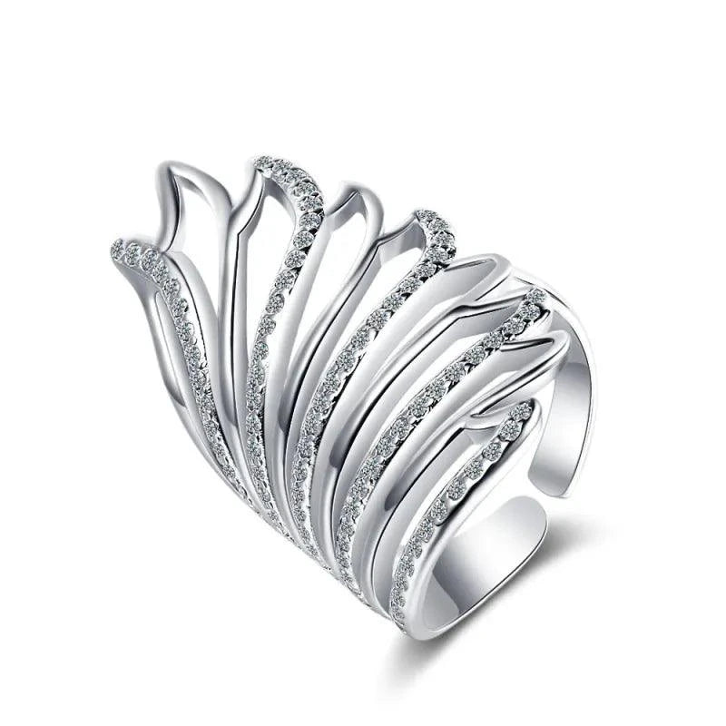 Mandotos Heavenly Diamond Wing Ring featuring sparkling diamonds and a delicate feather design in sterling silver.