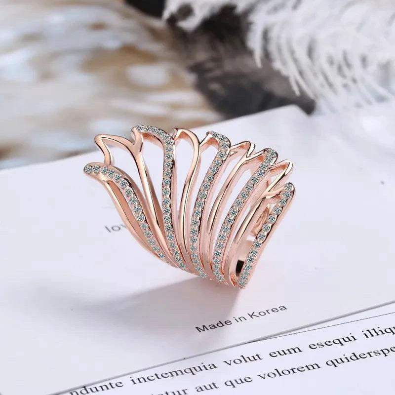 Mandotos Heavenly Diamond Wing Ring featuring sparkling diamonds and a delicate wing design on silver band.