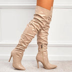 Mandotos high heel elastic knee-length patent leather boots featuring sleek design and shiny black finish.
