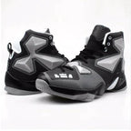 Mandotos high-performance outdoor basketball kicks showing black and white design, breathable upper, and durable sole for outdoor play.