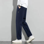 Mandotos Ice Silk men's summer casual pants in black and gray with elastic waistband, breathable straight-leg design, outdoor suitable