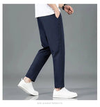 Mandotos Ice Silk men's summer casual pants in black and gray, slim fit, breathable, elastic straight-leg sweatpants for outdoor wear.