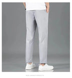 Mandotos Ice Silk men's summer pants in black and gray, breathable, elastic, straight-leg casual and outdoor sweatpants.
