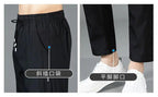 Mandotos Ice Silk men's summer casual pants in black and gray, featuring a straight-leg fit, breathable and elastic for outdoor wear.