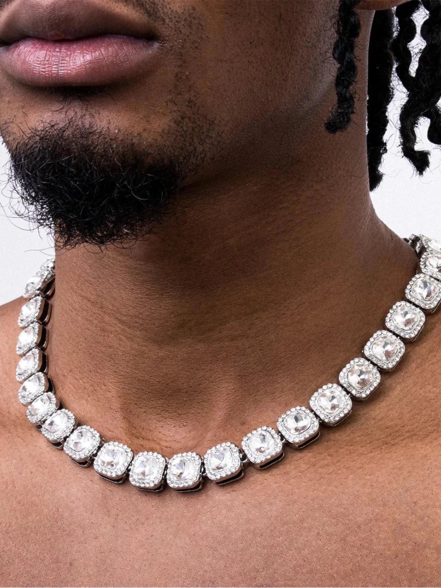 Mandotos Illumina tennis chain with clustered stones and radiant embellishments, showcasing elegant jewelry design.