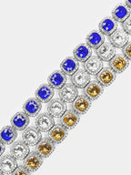 Mandotos Illumina tennis chain with clustered stones and radiant embellishments, showcasing elegant jewelry design.