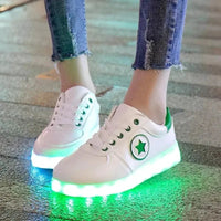 Mandotos LED light-up sneakers with sparkling soles, showcasing a stylish design perfect for illuminating every step.
