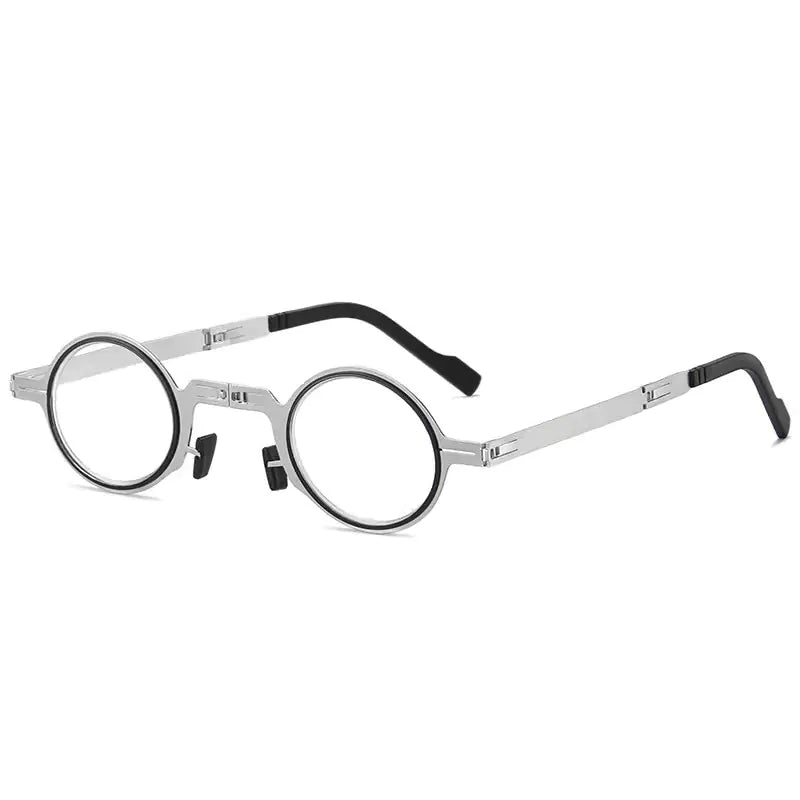Pair of 2024 SleekFold anti-blue light readers by MANDOTOS INTERNATIONAL with slim, stylish black frames and clear lenses.