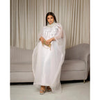 Elegant white African abaya for women with embroidery, plus size, suitable for parties or church events, by MANDOTOS INTERNATIONAL.
