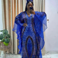 African Dashiki Ankara Maxi Dress for women by MANDOTOS INTERNATIONAL, traditional colorful long dress with vibrant patterns.