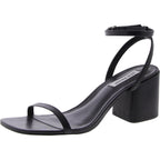 Audrina black leather sandals by MANDOTOS INTERNATIONAL featuring a stylish open-toe design and ankle strap.